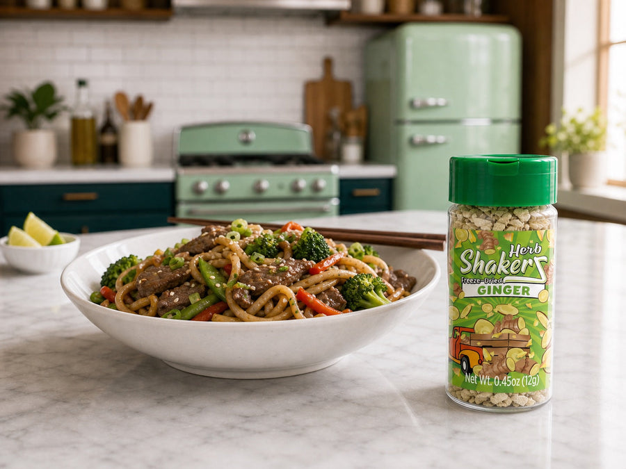 Ginger Herb ShakerZ jar beside a beef and broccoli noodle stir-fry