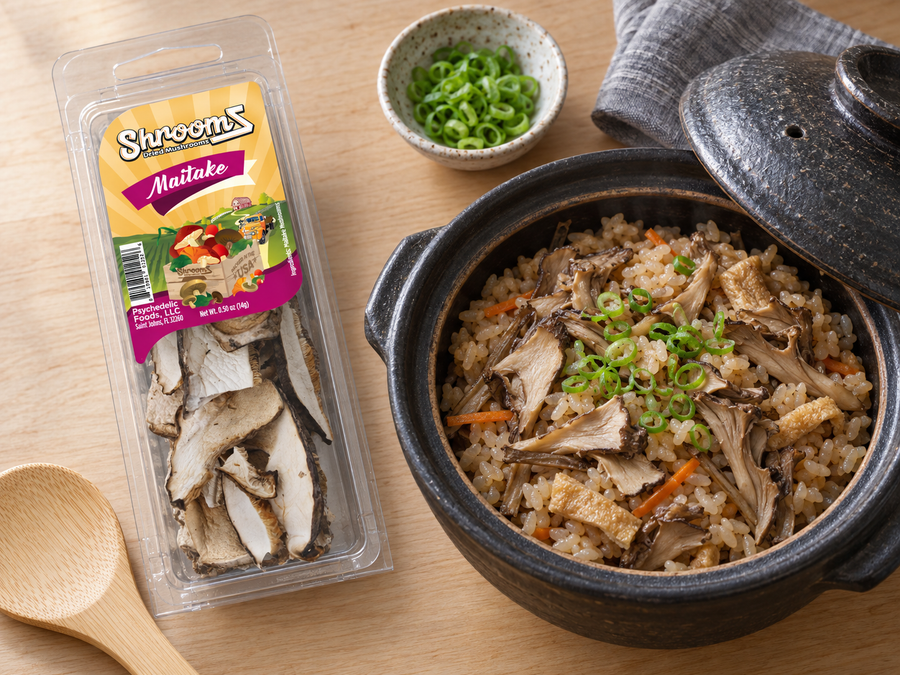 Maitake ShroomZ beside a clay pot of mushroom rice — lifestyle